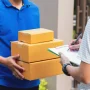 Courier carrying multiple packages for local delivery